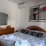 Апартаменты Casa Delle Rose Terrazza Vista Mare Panoramica E Relax A Cala Gonnone, Wifi, Ac